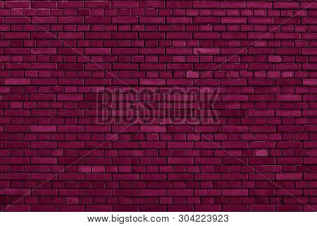 Detail Of A Tyrian Purple Brick Wall Background