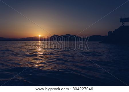 Beautyful Sunset Over Sea In Busan With City Landscape View