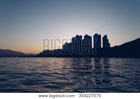 Cityscape Of Busan From The Sea At Dusk Time With Sunset View