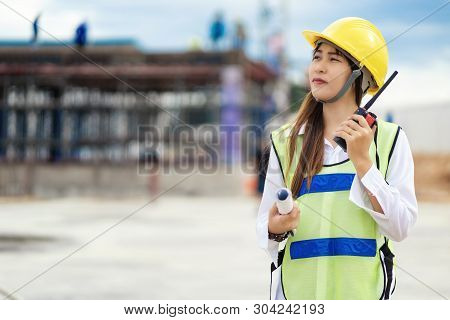 Civil Engineering Is Using Radio Communication. Contact The Site For Work On The Construction Of The