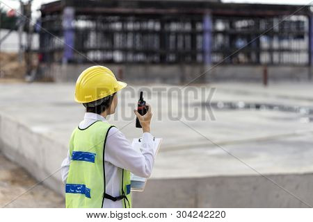 Civil Engineering Is Using Radio Communication. Contact The Site For Work On The Construction Of The