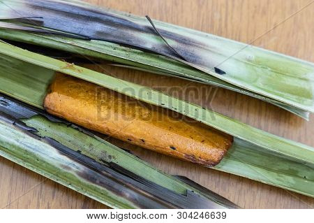 Otak Otak, Food With Fish Wrapped In Leaf And Grilled.