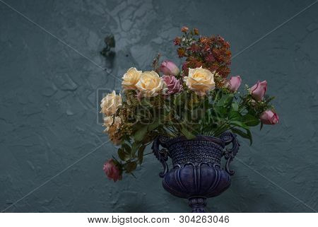 Beautiful And Stylish Artificial Flowers On A Blue Background