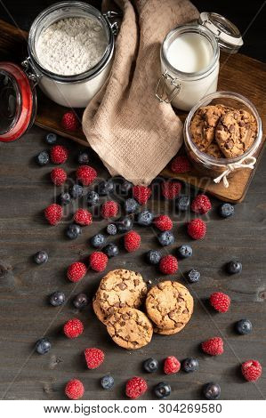 Forest Fruits, Homemade Cookies, Milk And Flour Table Top.
