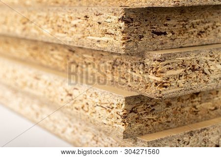 Particleboard With Veneer Is Cut Into Small Pieces. Materials For Carpenters To Build Furniture.