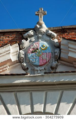 Family Coat Of Arms At The Entrance In Castle Ostrozkyi In Dubno, Rivne Region In Ukraine. Vertical 