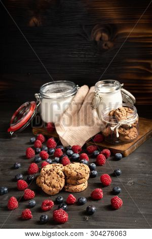 Raspberry, Biscuits And Milk, Flour Jars With Copyspace Above