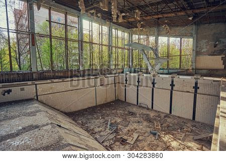 Former Swimming Pool In Pripyat, The Ghost Town In The Chernobyl Exclusion Zone Which Was Establishe