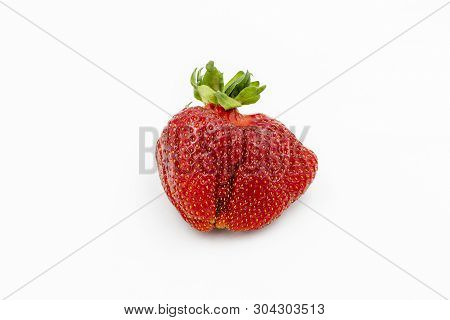 Imperfect Fruit. Fresh Organic Strawberry Isolated On White. Red Juicy Berry Closeup. Freshness Dess