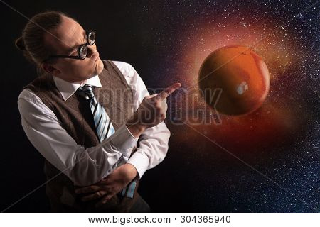 Funny Scientist Looking To Universe And Planet Mars