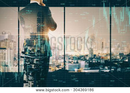 Businessman Standing On Abstract City Background With Forex Chart. Invest And Professional Concept. 