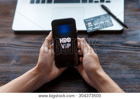 Richmond, Virginia, Usa -30 May 2019: Female Hands Holding A Smartphone With Hbo Logo Before The Sho