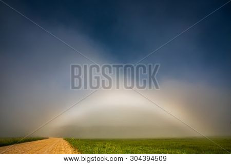 Rare White Rainbow Fogbow Near The Path