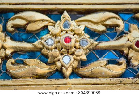 Thai Pattern On Wall At  Wat Rakhang Khositaram Bangkok ,thailand