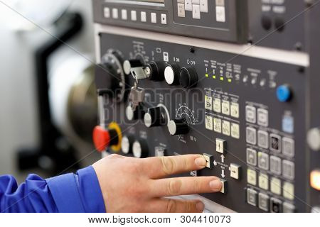 Engineer Setup Operation Parameters Of Cnc Lathe Machine Using Buttons On The Control Panel. Selecti