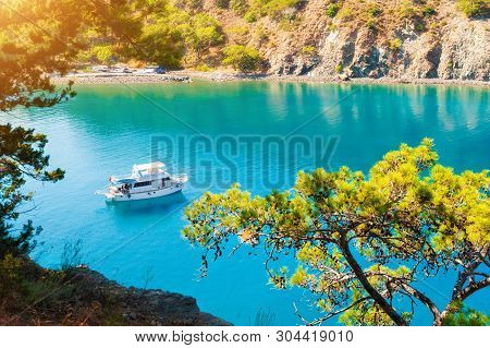 Tourist Boat In The Sea In Beautiful Bay Near Kemer, Turkey. Famous Travel Destination