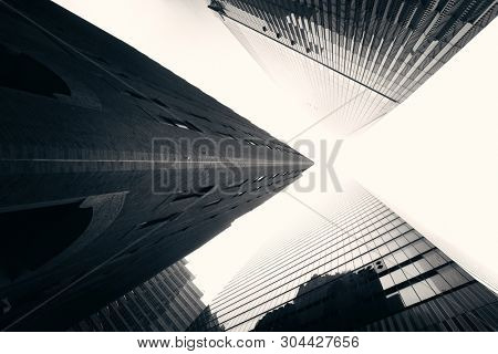NEW YORK CITY - NOV 12: Downtown skyscrapers in a foggy day on November 12, 2014 in Manhattan, New York City. With population of 8.4M, it is the most populous city in the United States.