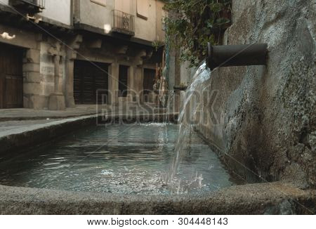 Stone Fountain With Crystal Clear Water