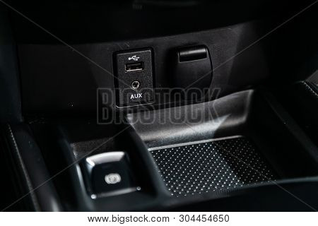 Сlose-up Of The Car  Black Interior:  Power Outlet 12v, Usb, Aux And Other Buttons.