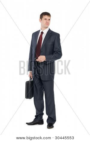 En attente d'un beau jeune homme d'affaires avec un téléphone portable.
