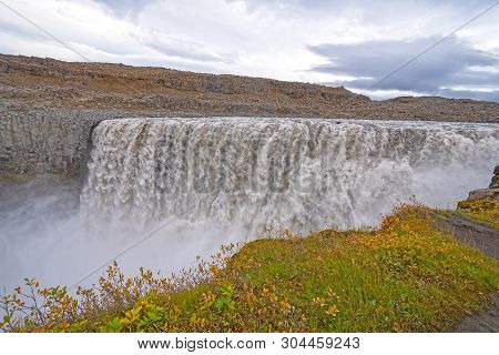 Massive Water Flow Over Detifoss In Northern Iceland