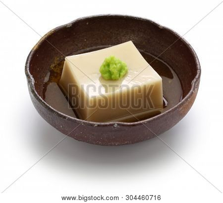 homemade sesame tofu, gomma dofu,  japanese traditional vegan cuisine.
goma dofu is made from three simple ingredients : ground sesame paste, water and kuzu powder.