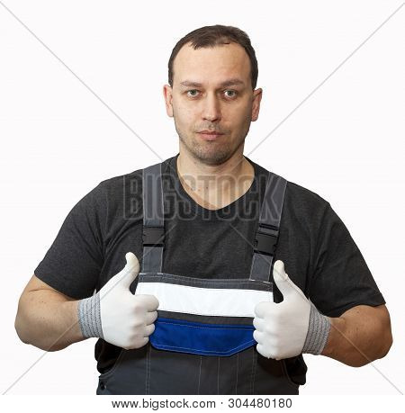 Maintenance And Repairing Concept. Mechanic Or Plumber With Gas Key In Hands.  Call The Repairman At