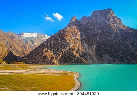 Deep Green Water Of Sheshnag Lake Veiwed From A Camping Site Along The Banks Of The Lake