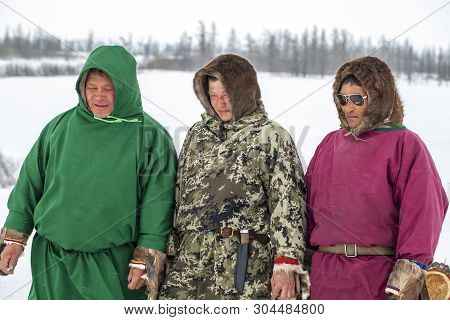 Nadym, Russia - April 22, 2019: Yamal, Open Area, Tundra, The Extreme North, Three Reindeer Herders