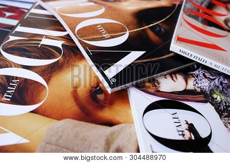 Heap of Vogue Italia fashion, beauty and lifestyle magazines. Pile of Conde Nast publications cover 
