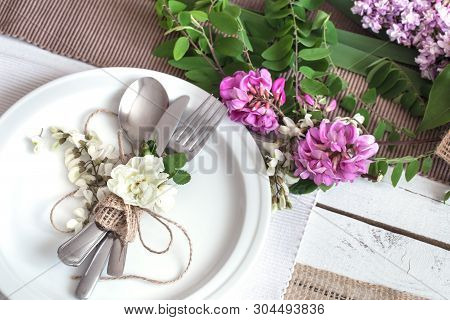 Beautifully Elegant Decorated Table For Holiday - Wedding Or Valentine Day With Modern Cutlery, Bow,