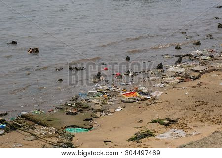 Trash, Plastic, Garbage, Bottle... Environmental Pollution On The Beach. Royalty High-quality Free S
