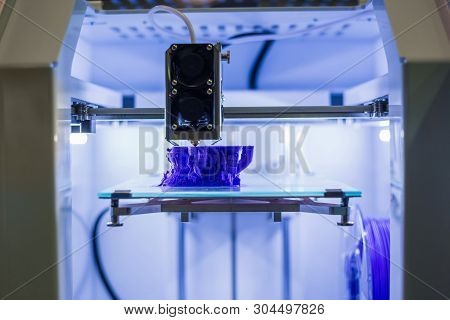 Process Of Printing Physical Plastic Model Of Purple Toy Castle On Automatic 3d Printer Machine. Add