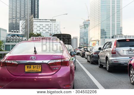 Cars On Busy Road In The City With Traffic Jam