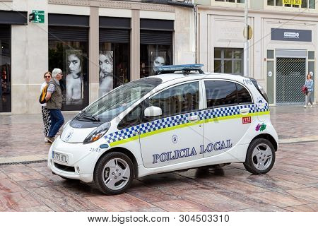 Malaga, Spain - May 24, 2019: A Small Police Car Parked In The City Centre.