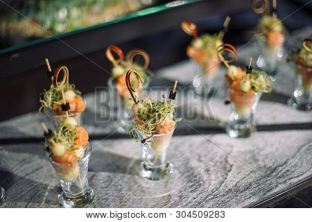 Salmon And Shrimp Kanape In Glass Cups.