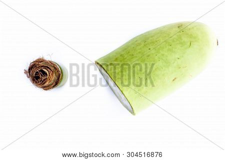 Raw Organic Cut Half Bottle Gourd Isolated On White Along With Its Extracted Beneficial Oil In A Sma