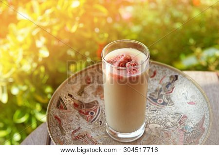 Boza. Traditional Turkish And Albanian Drink Served In Outdoor Summer Cafe Combined With Strawberry 
