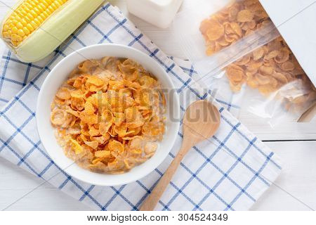 Corn Flakes In Bowl With Milk And Cereal Corn Flakes Box, Energy Health, Breakfast Daily Food. Top V
