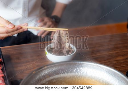 Cooking of japanese wagyu beef Shabu Shabu set hot pot