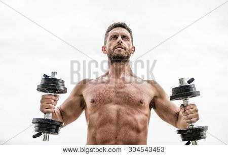 Best Exercise. Muscular Man Exercising With Barbell. Fitness And Sport Equipment. Man Sportsman With