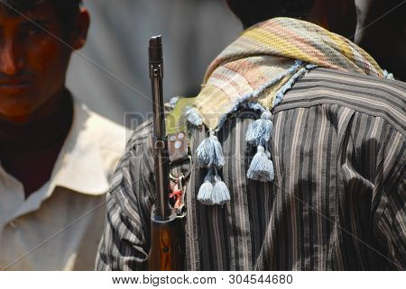 Aden, Yemen - September 14, 2006: Unidentified Yemeni Man Holds A Rifle On His Shoulder At The Stree