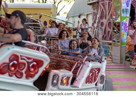 Plaerrer, Augsburg Germany, April 22, 2019: Young Families Enjoying Their Time With Kids In A Carniv