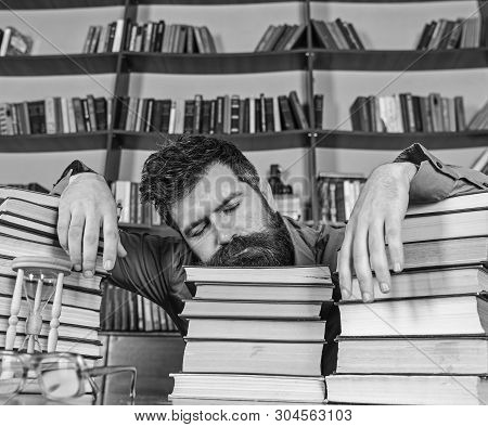 Teacher Or Student With Beard Fall Asleep On Books, Defocused. Overstudied Concept. Man On Sleeping 
