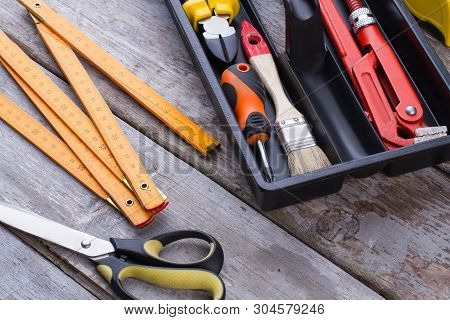 Carpenter Tools On Wooden Background. Various Construction Tools For Repair.