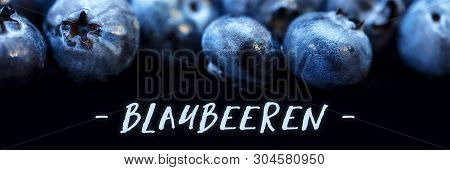 Banner, Whortleberries With Black Background, German Word Blaubeeren Which Means Blueberries