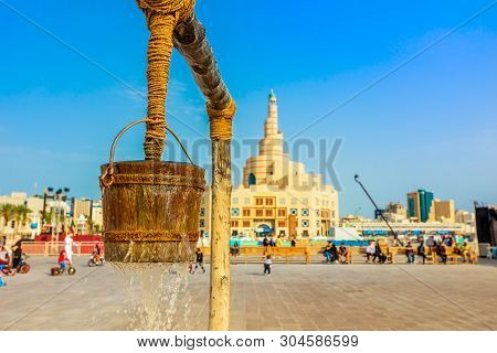 Closeup Of Flowing Water At Old Well Fountain, Famous Place In The Middle Of Souq Waqif, Doha Center