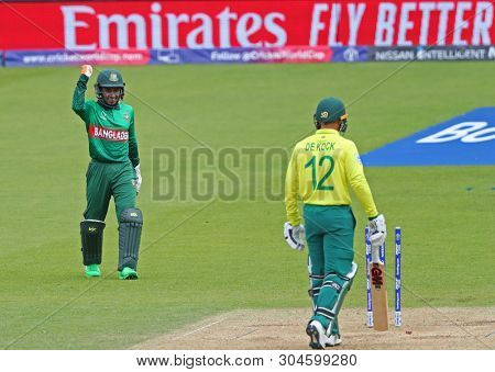 LONDON, ENGLAND. 02 JUNE 2019: Mushfiqur Rahim of Bangladesh celebrates running out Quinton de Kock of South Africa  during the South Africa v Bangladesh, ICC Cricket World Cup match