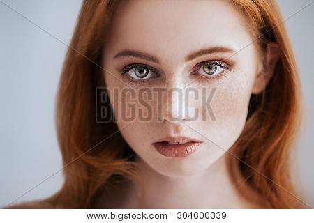 A close up portrait of a lovely mysterious girl. Beauty, cosmetics.