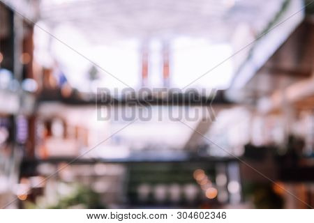 Defocused Blurred Image Of Shopping Mall In Vintage Retro Style.